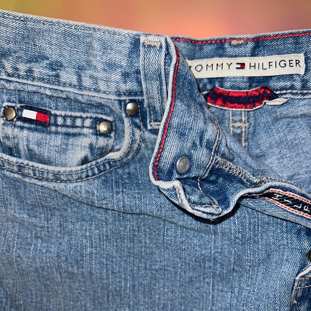 custom cut Tommy Hilfiger shorts.